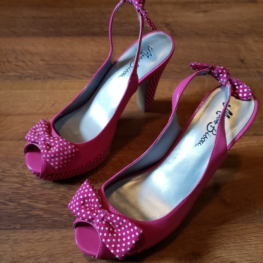 Pink polka dot open toe heel.